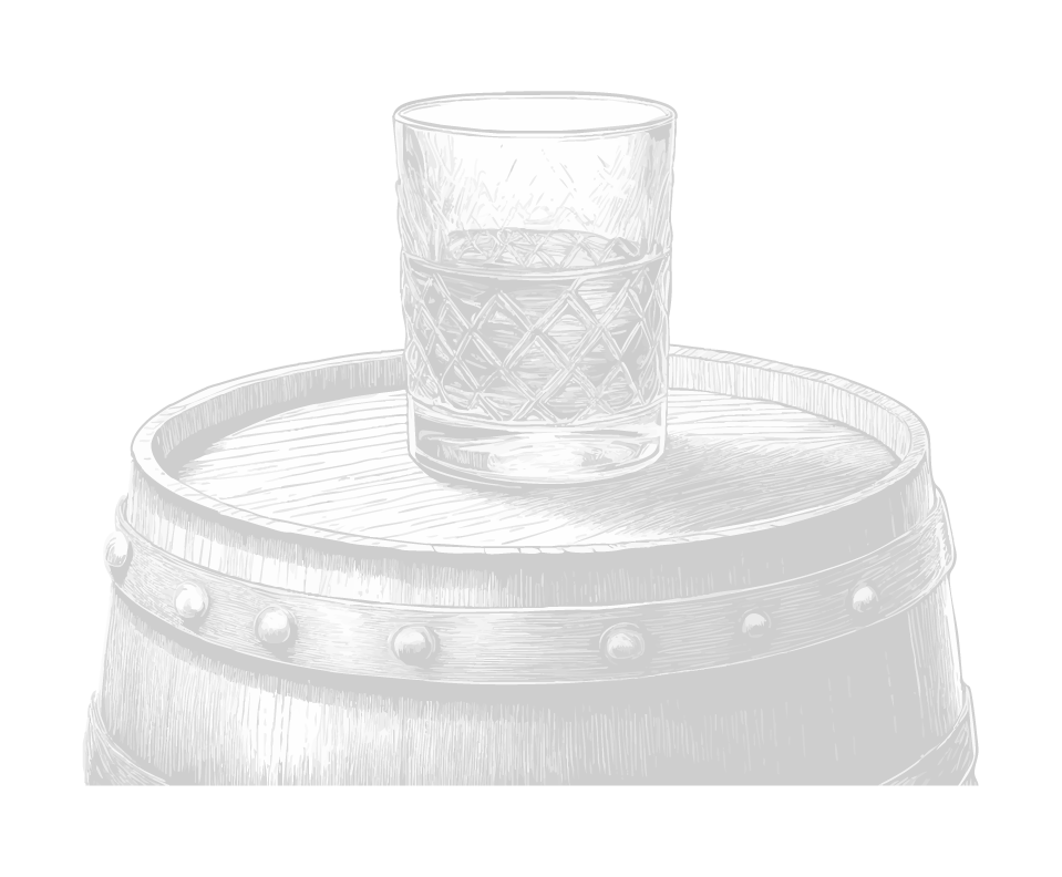 whiskey glass ontop of a barrel